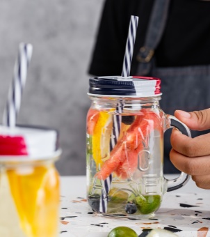 Glass with heat-insulated handle
