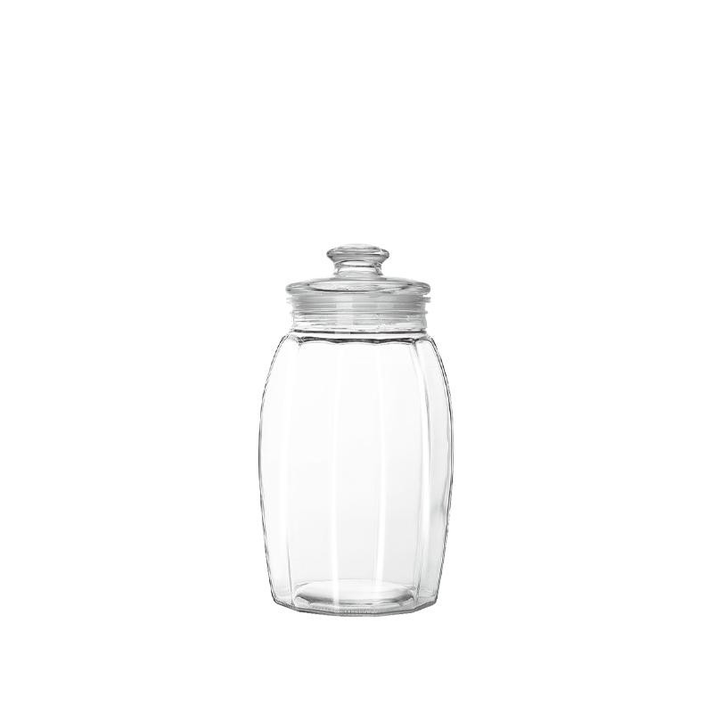 Xinghuo Glass vertically ribbed curved glass storage jar with a glass pressure cap. Made of high-transparency lead-free glass, it is specially designed for dry goods storage, food packaging, and export wholesale.
