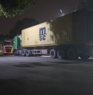 Xinghuo Glass MSC container truck night shipping