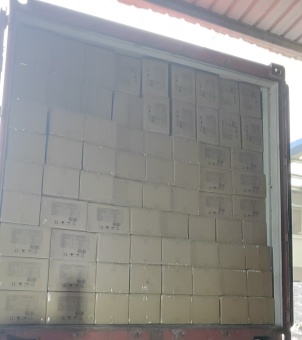 Xinghuo Glassware boxes were neatly stacked inside a container bound for Argentina.