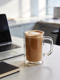Xinghuo borosilicate cappuccino mug on modern office desk