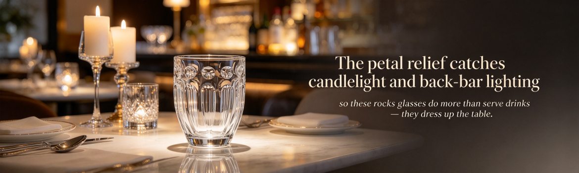 Embossed rock glasses served with cocktails and spirits on a bar counter
