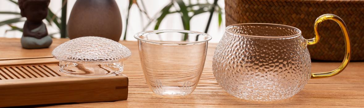 xinghuo-glass-hammered-tea-infuser-cup-set-banner Display image of the xinghuo glass hammered glass tea cup lid, filter, and body (three-piece set).